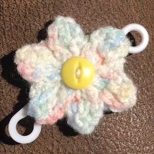 Face mask holder hooks mask elastic behind head